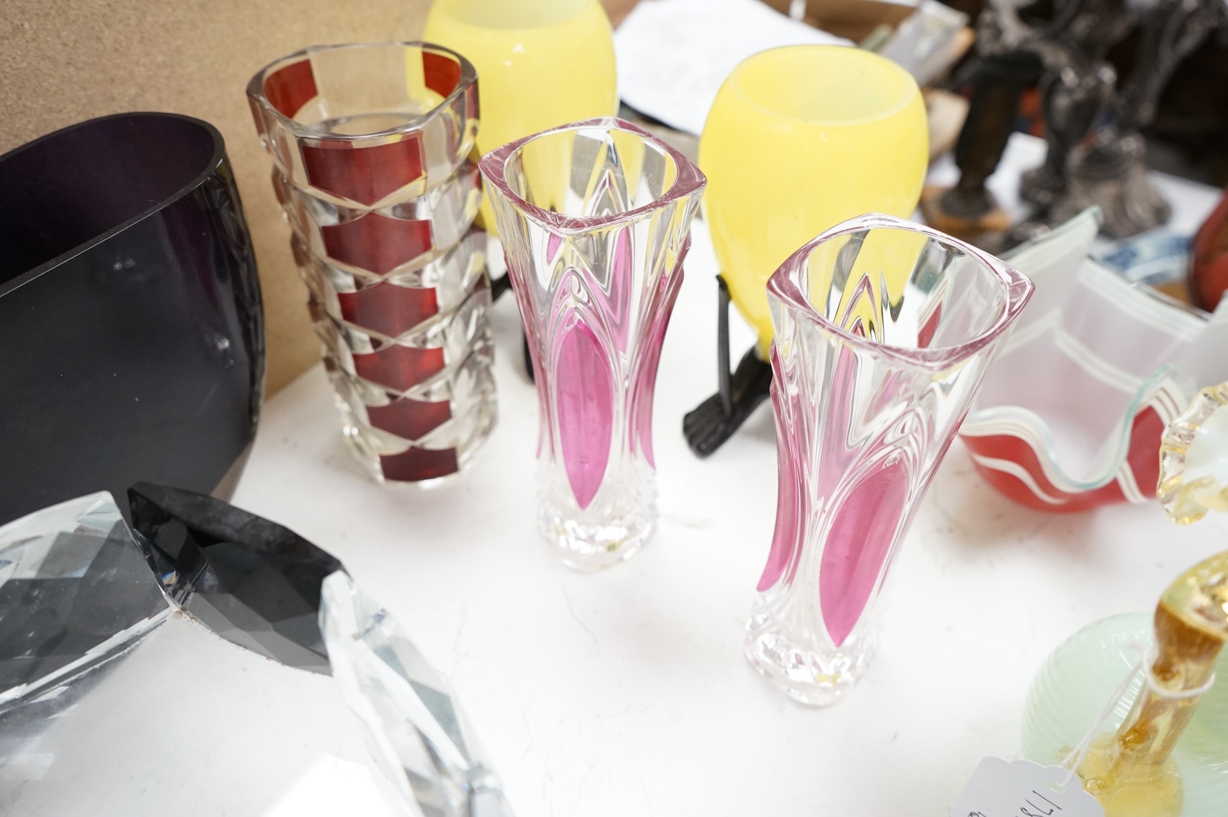 Mixed glassware to include a green Mary Gregory jug, a 'vaseline' glass ewer, an Art Deco style clear and black glass fruit tazza, etc.